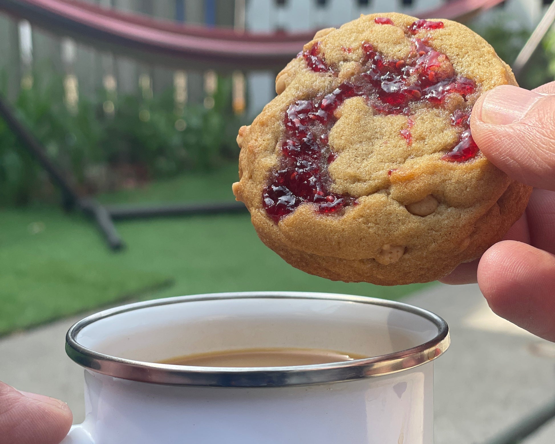 Old School Jam cookie from the Bearded Baker about to be dunked in a cup of PÜRK Coffee