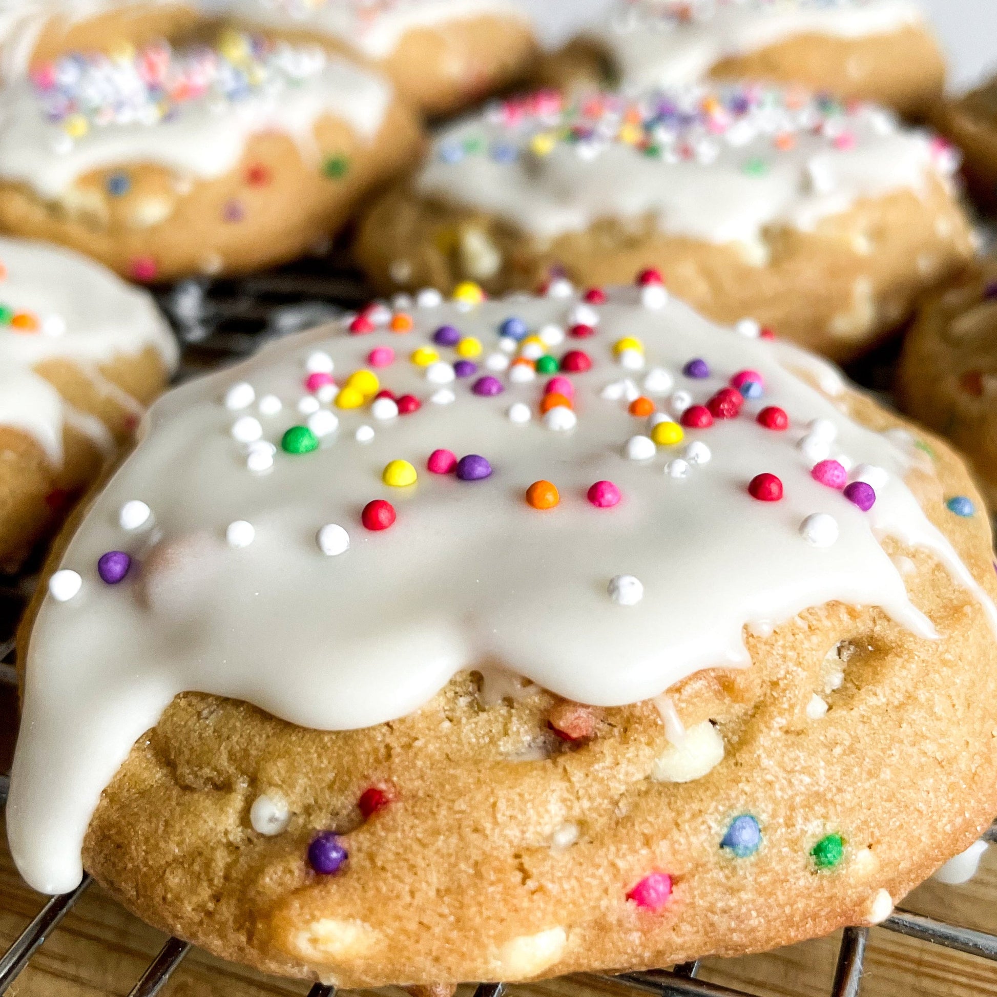 They Say It's Your Birthday cookies from the Bearded Baker. Vanilla glaze, white chocolate, and colourful sprinkles.