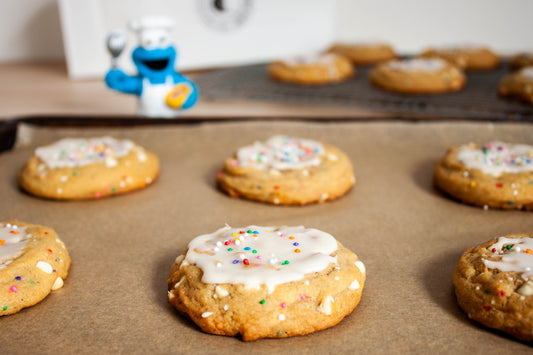 They Say It's Your Birthday cookies from the Bearded Baker. Vanilla glaze, white chocolate, and colourful sprinkles.